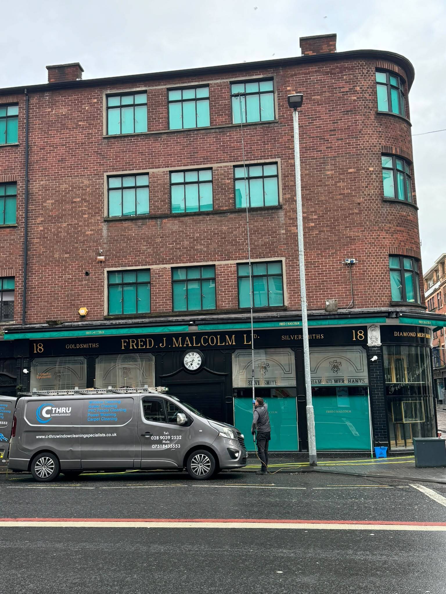 C-thru Window Cleaning Specialists cleaning a jewellery shop